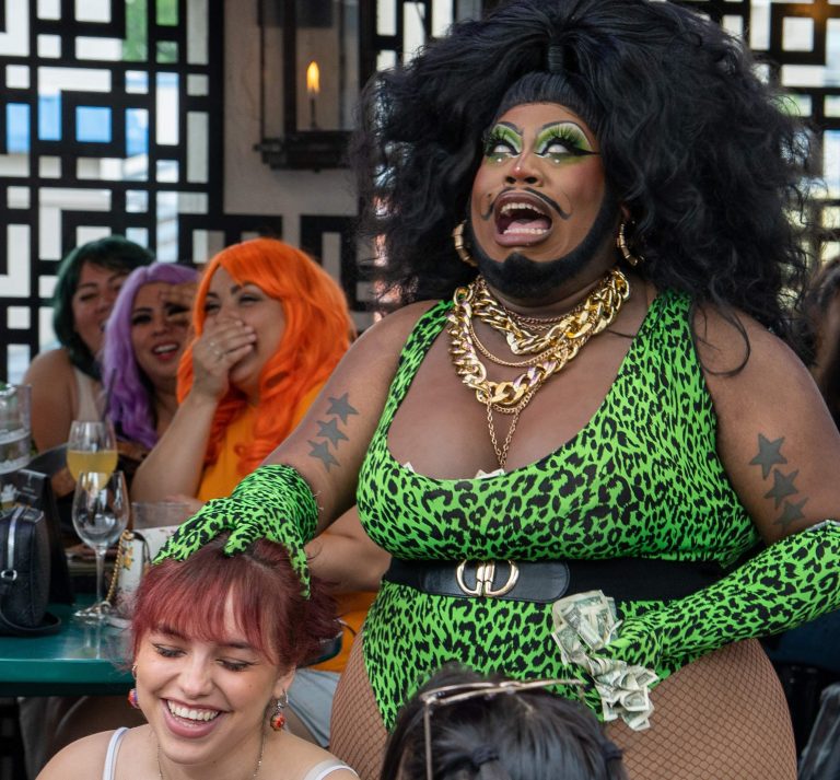 Queen interacting with guests